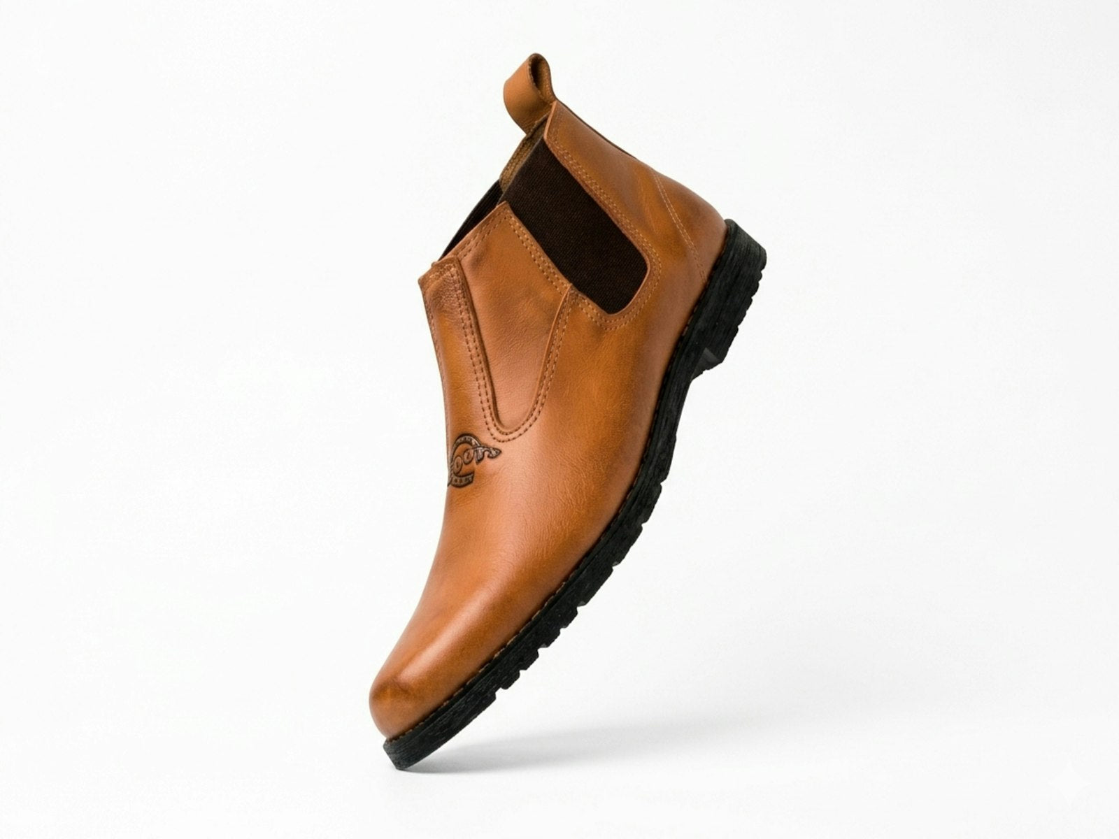 Tan leather chelsea boot shown as a clean product shot against a white background